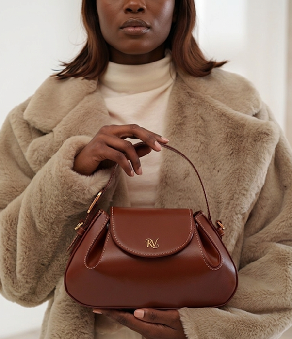 Model holding Kena Vella bag